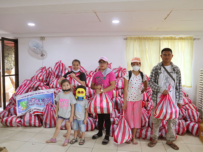 One of the families that received pandemic essentials inside the Pagasa building.