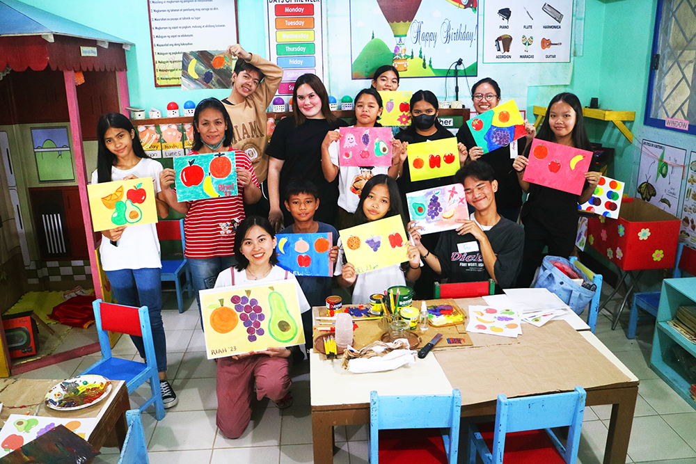 Some kids after a painting session with their Teaching Artist, Riah at Pag-asa's classroom