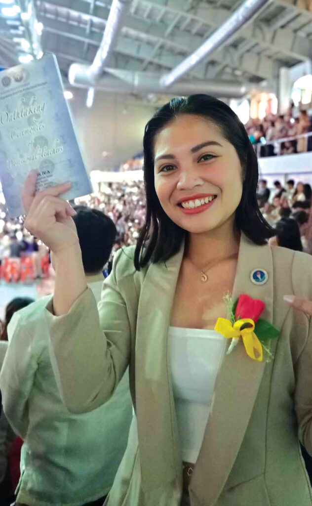 Arnel Lacambra, Teacher Sharlene, and Vince Totanes during their oath taking.