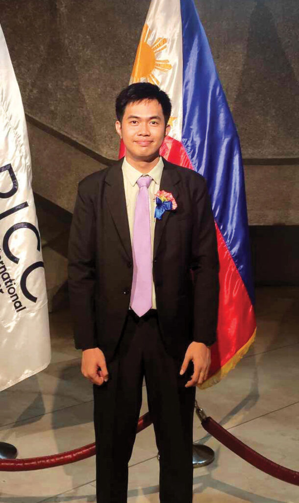 Arnel Lacambra, Teacher Sharlene, and Vince Totanes during their oath taking.