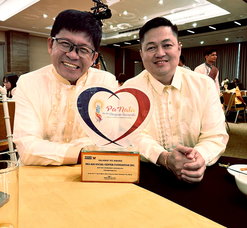 A moment of profound gratitude and well-deserved recognition. The heart-shaped trophy speaks volumes. A moment of profound gratitude and well-deserved recognition. The heart-shaped trophy speaks volumes.