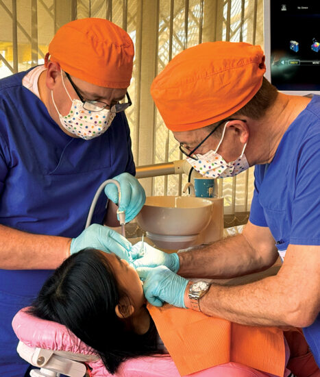 Hopeful smiles, healthy futures. The “Two Hands, One Mission” team, making a difference.